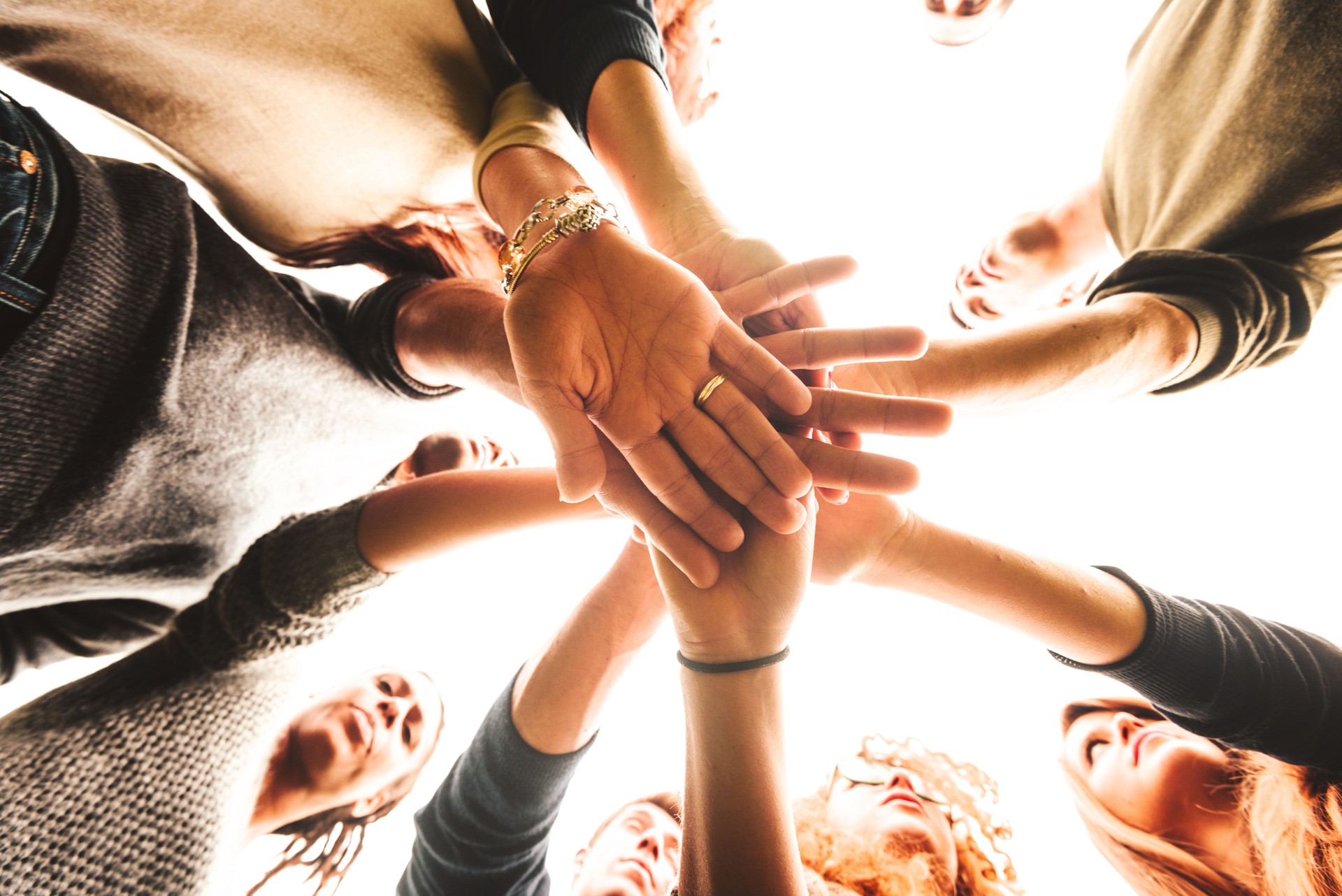 stack of hands for the teamwork of friends